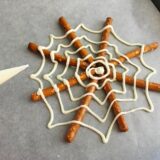 A Spooky Snack For This Halloween: Pretzel Rod Spider Webs