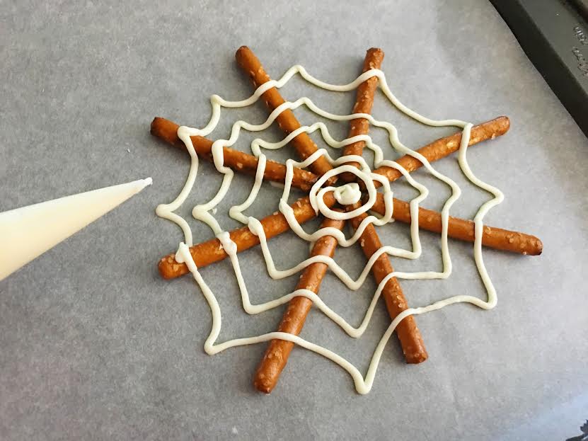 A Spooky Snack For This Halloween: Pretzel Rod Spider Webs