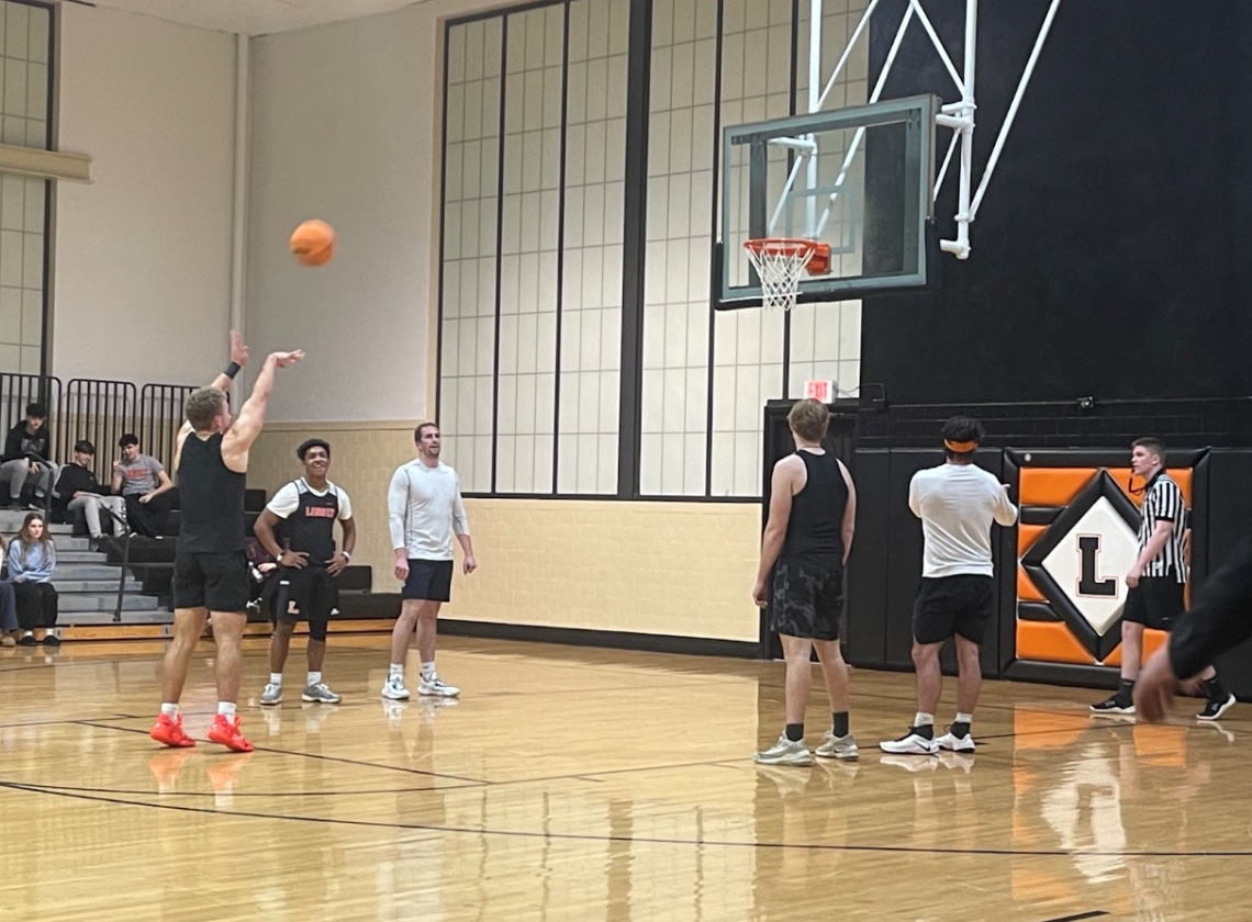 Faculty Takes the Win in Senior vs. Faculty Basketball Game